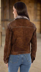 woman wearing a brown suede jacket