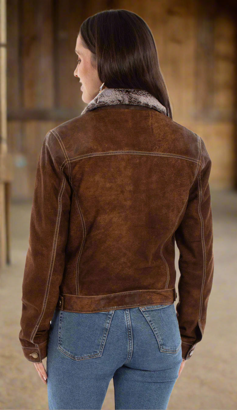 woman wearing a brown suede jacket