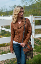 Beautiful-Woman-Carrying-Suede-Fringed-Handbag-by-Scully-B136