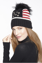 Beautiful-Woman-Wearing-American-Flag-Stars-and-Stripes-Stocking-Cap-with-Genuine-Fur-Pom-Pom-by-Linda-Richards-HA52