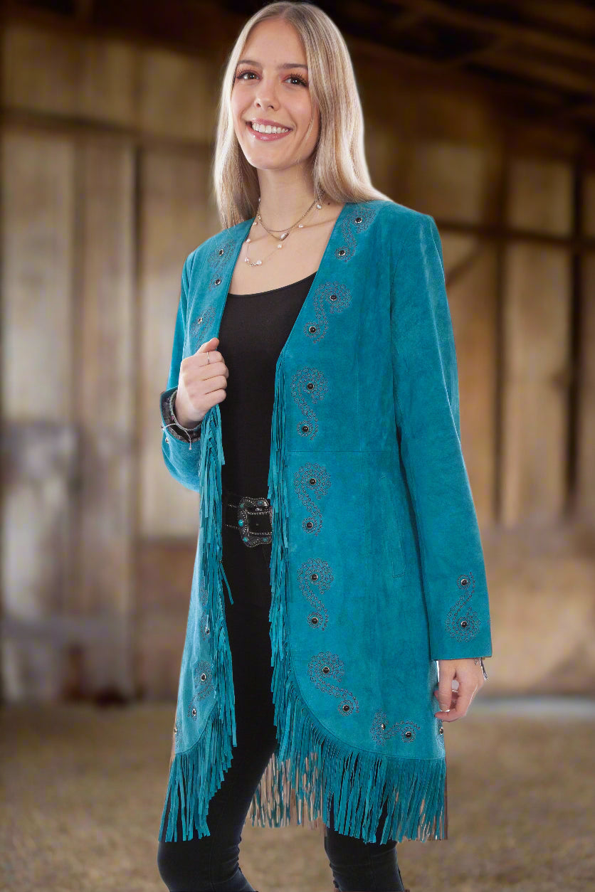 Woman wearing long Western Style Suede Jacket with Fringe.
