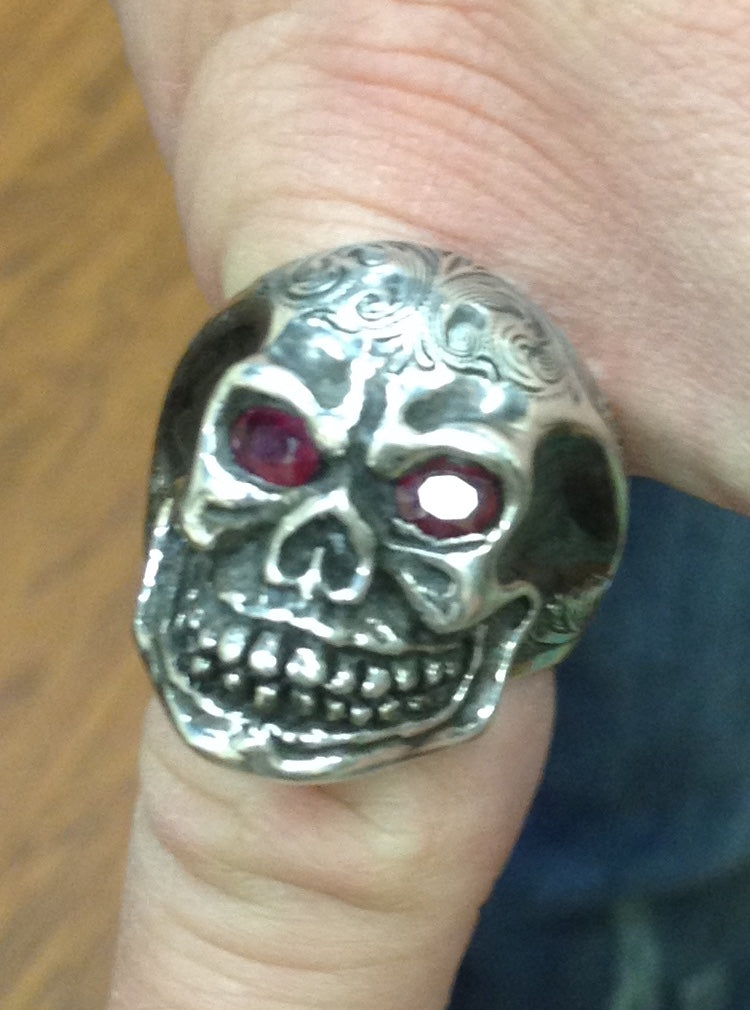 Hand-Engraved Sterling Silver Skull Ring with Ruby Eyes Hand-Engraved Sterling Silver Skull Ring with Ruby Eyes